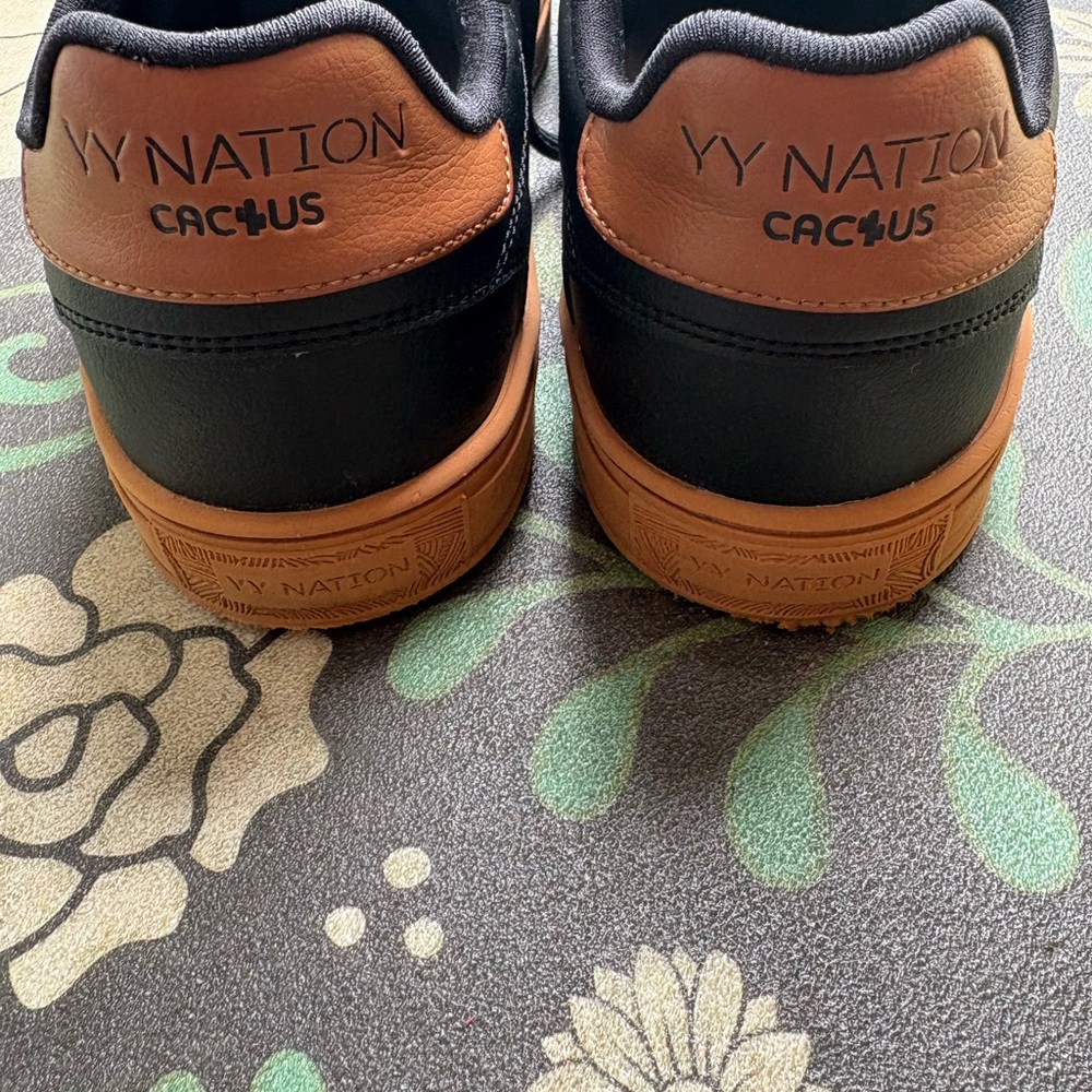 Women's black and tan sneakers